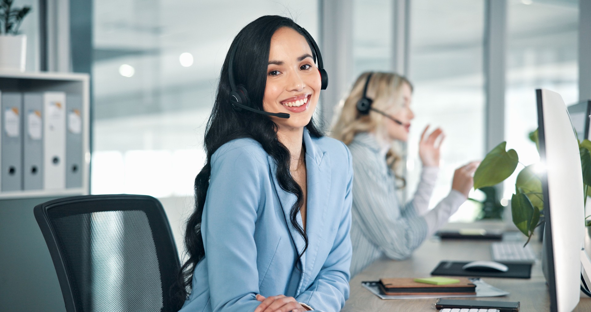 Call center, businesswoman and portrait with headset for telemarketing, customer service and happiness. Office, coworking and sales consultant with computer for faq research, support or communication